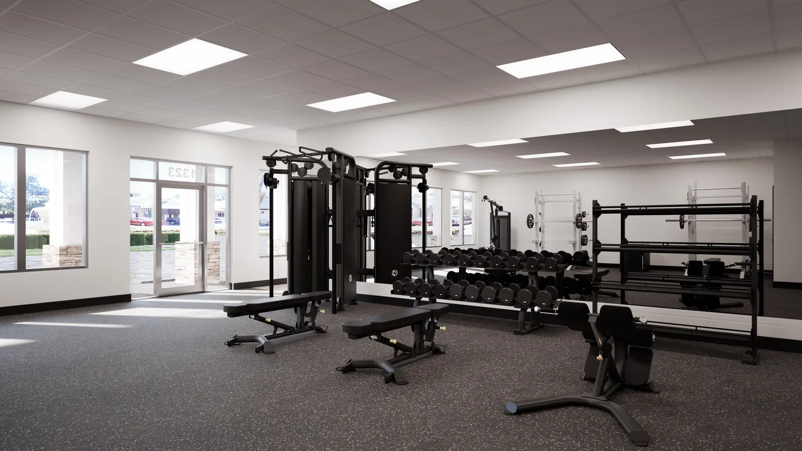 A wide view of the new Valdes Performance training floor, bright with natural light from the entrance